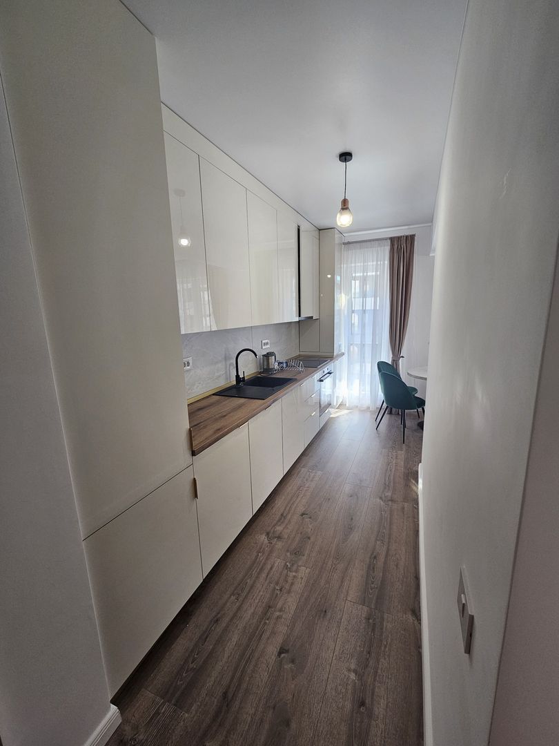 Apart 2 cam cu terasa 12 mp +loc de parcare - Poză 13