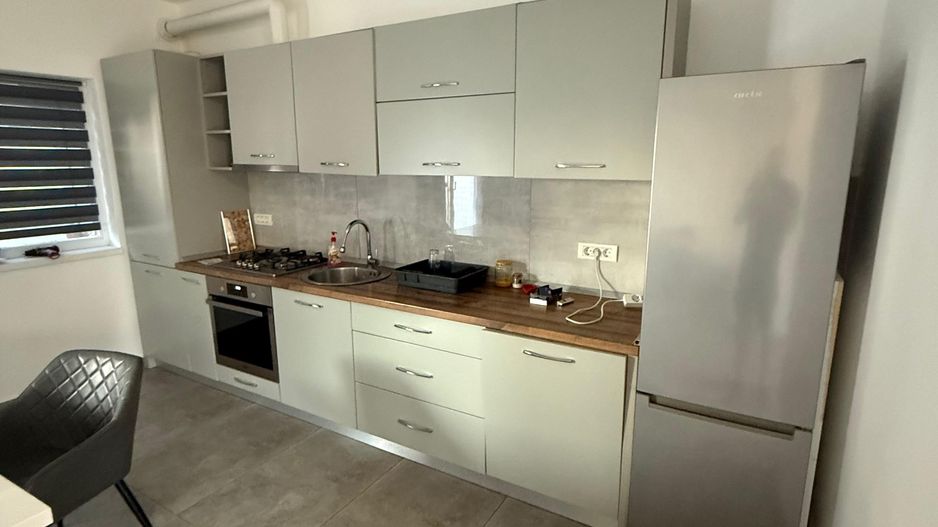 Locuinta cu 3 camere, curte si 2 locuri de parcare - Poză 4