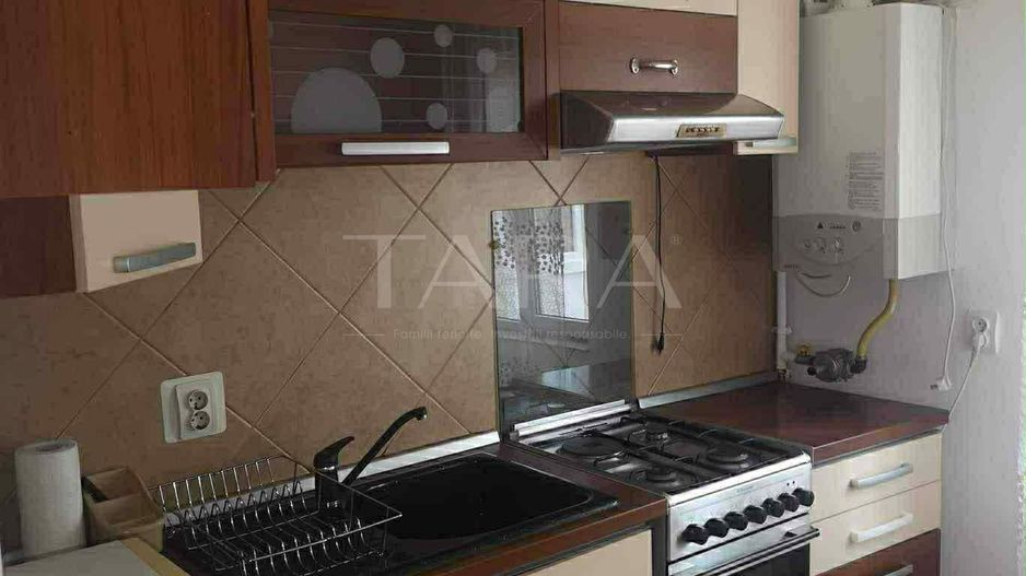Apartament cu 2 camere, complet mobilat, într-o zonă liniștită. - Poză 1