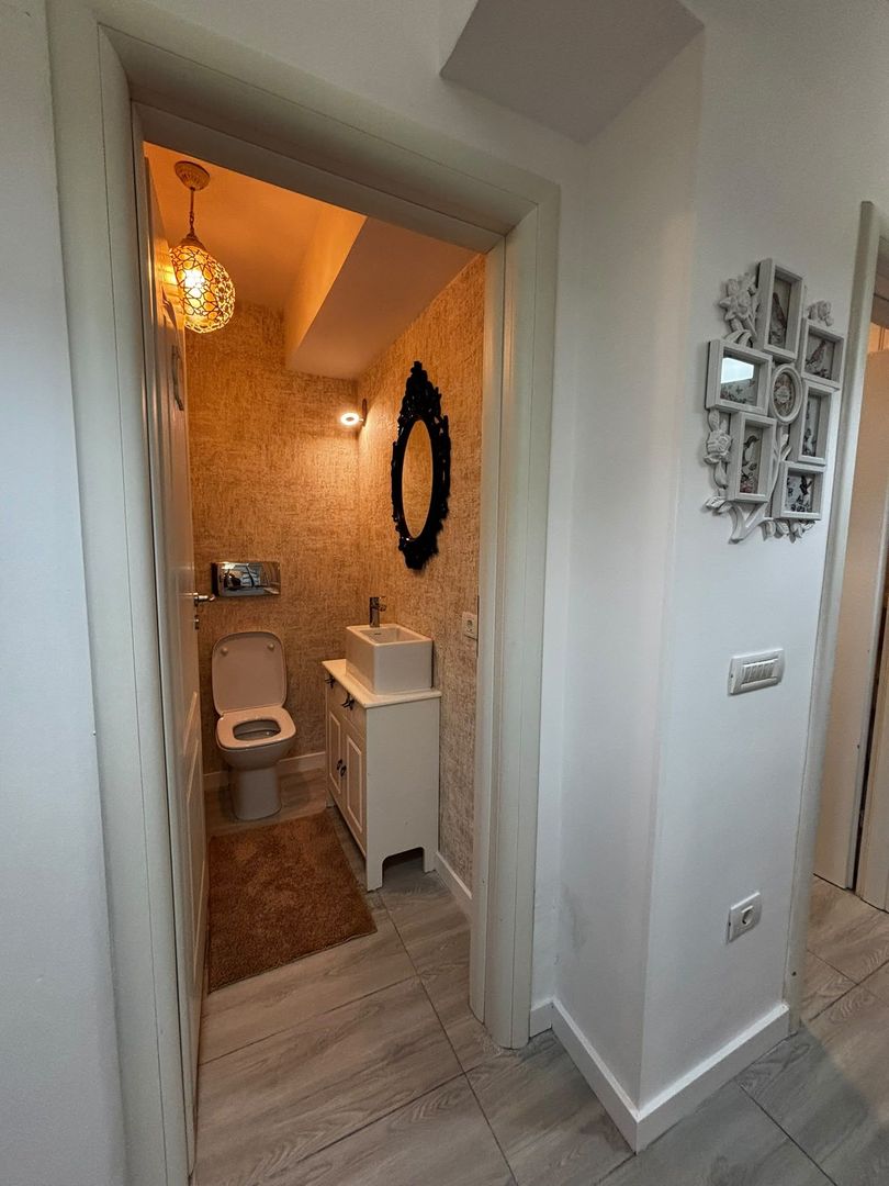 Apartament Modern și Spațios cu Grădină Privată și 2 Locuri de Parcare Incluse! - Poză 12