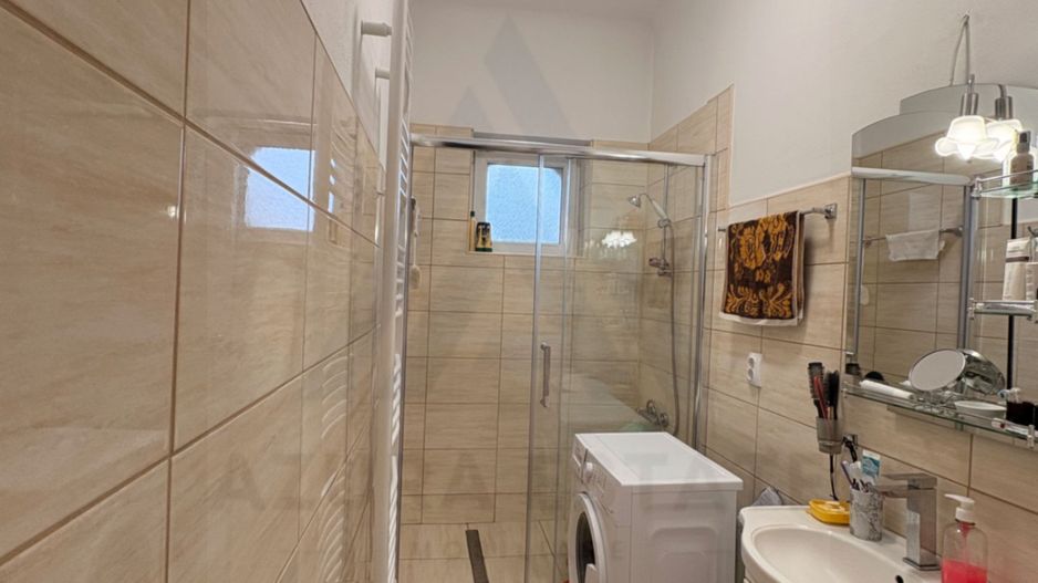 Apartament decomandat 70 mp utili 2 bai pivnita si curte 58 mp Central - Poză 15