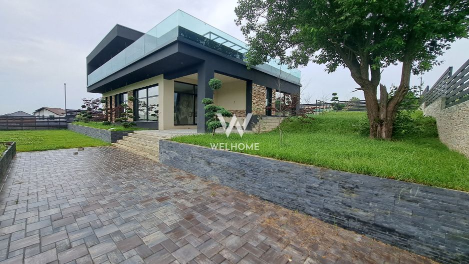 Vilă modernă premium cu piscină interioară, teren 1200 mp și panoramă - Poză 1