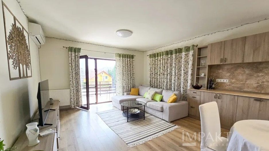 Apartament la vilă în zona liniștită - Poză 1