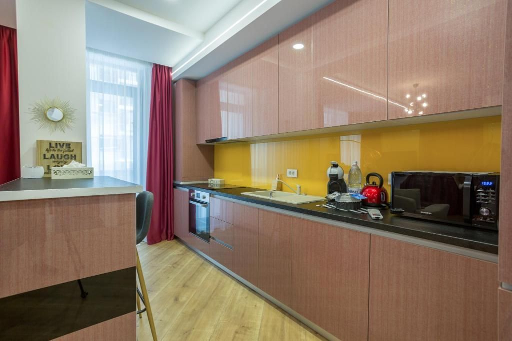 Un duplex modern cu terase generoase, între verdeața Parcului Verdi și oraș - Poză 3