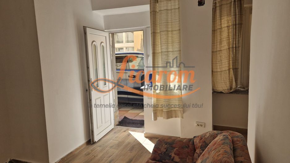 Garsoniera in casa str Iuliu Maniu curte comuna. - Poză 3