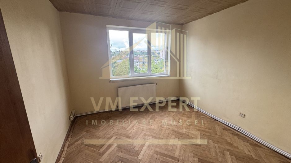 APARTAMENT 3 CAMERE ETAJ 4 CAMPULUNG VISOI - Poză 4