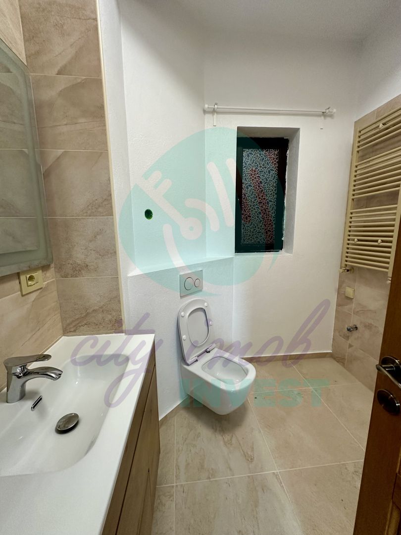 Garsoniera renovata intr-o zona boema - Poză 10