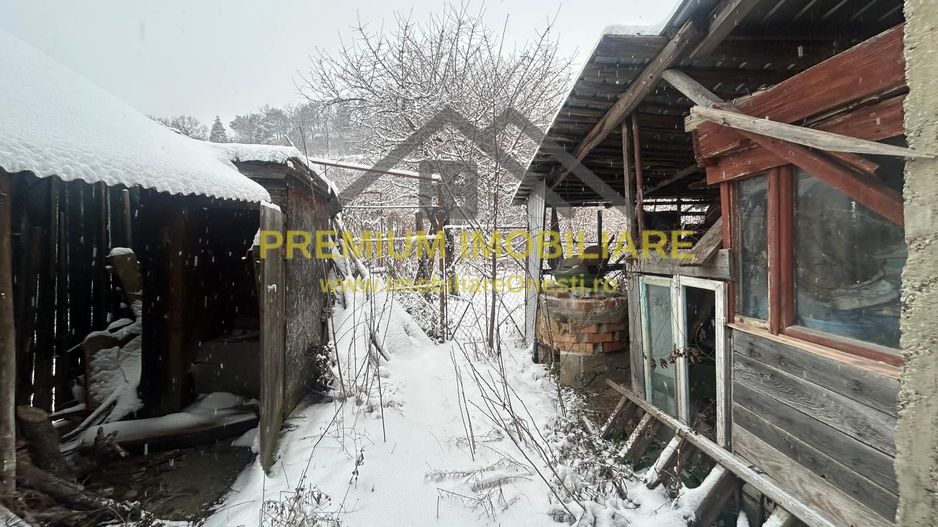 Casă batraneasca+ teren 999 mp intravilan în Oituz - Poză 17