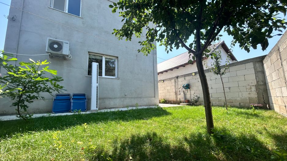 Casă P+1E cu terasă circulabilă, garaj amenajat și finisaje moderne - Poză 2