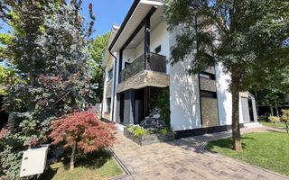 Casa P+1+M cu teren de 650 mp, piscina si curte complet amenajata - Poză 4
