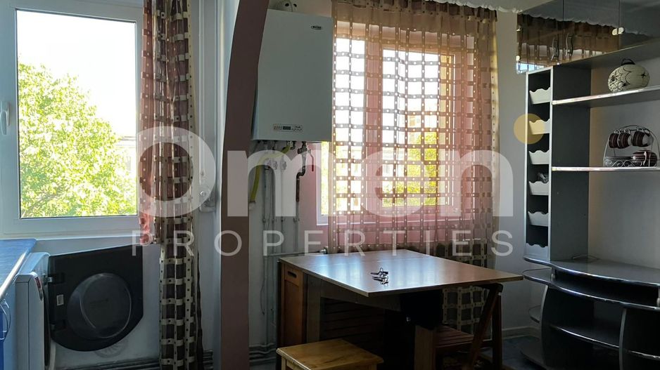 Apartament 2 camere– Cuza Vodă | Etaj 4/4 | Bucătărie spațioasă și luminoasă - Poză 1