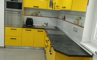 Casă individuală cu 2 apartamente separate, teren 650 mp, garaj și terasă - Poză 2