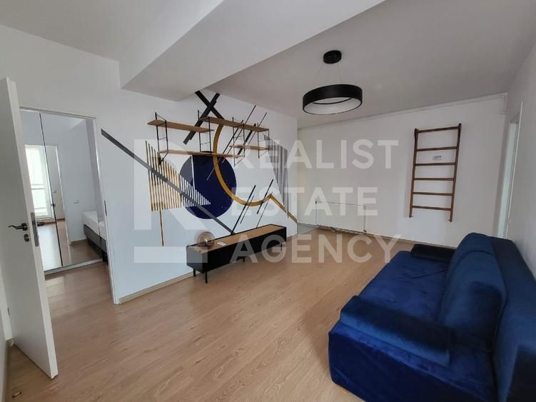 Studio semidecomandat cu zonă de dormit separată + parcare subterană - Poză 1