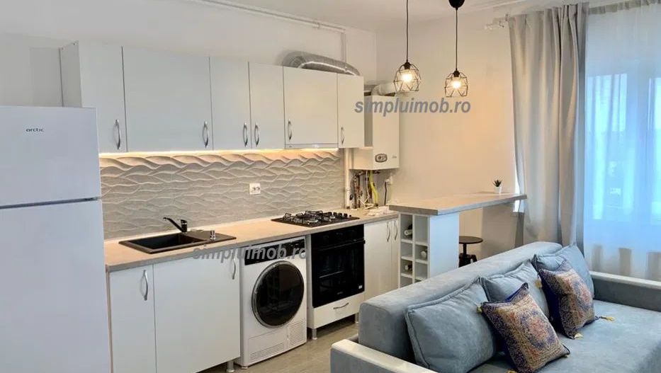 Centrala proprie bloc nou studio renovat mobilat Ozana - Poză 2