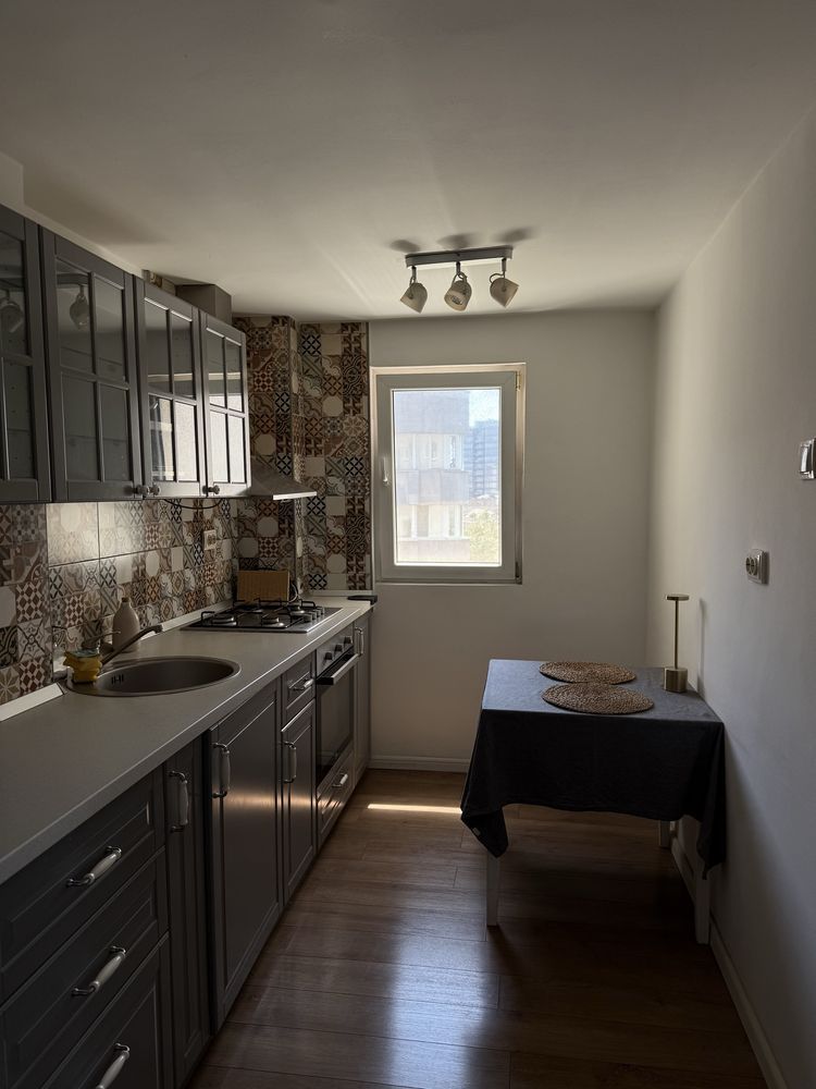 APARTAMENT  RENOVAT COMPLET MOBILAT METROU ZONA PIATA VICTORIEI - Poză 4
