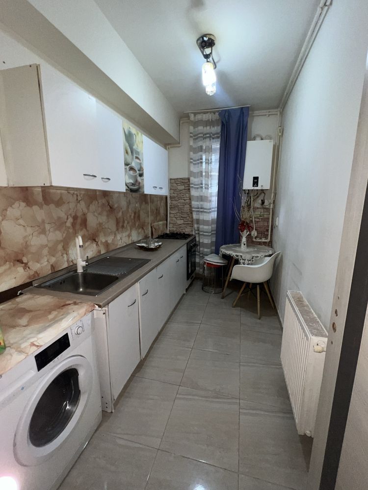 Inchiriere Apartament cu 3 camere Ozana, centrala proprie, demisol - Poză 6