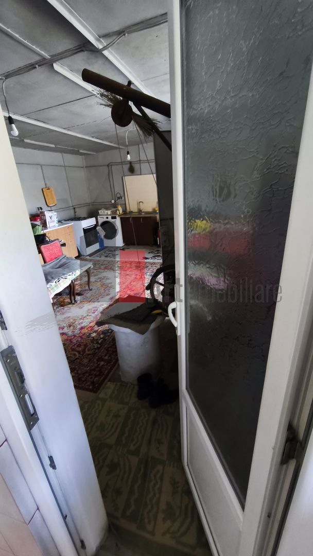 Casa curte cu teren 1600 mp Manolache - Poză 19