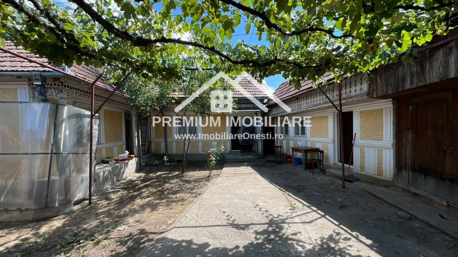 Casa batraneasca cu 1042 mp teren - Poză 1