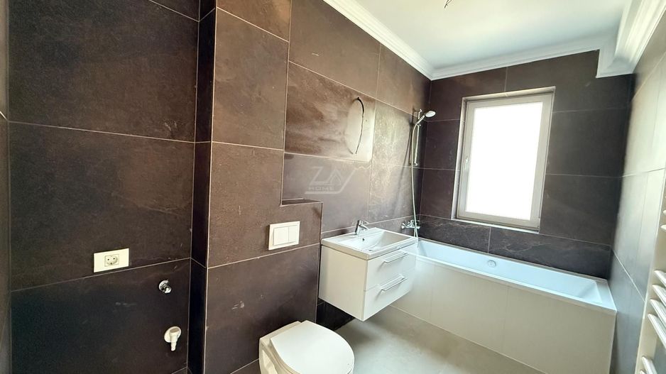 Bloc finalizat. Gradina proprie. Drum asfaltat. Loc de parcare. - Poză 3