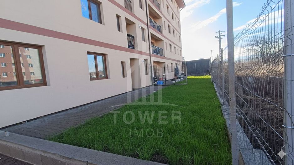 Apartament cu trei camere si gradina proprie - Poză 1