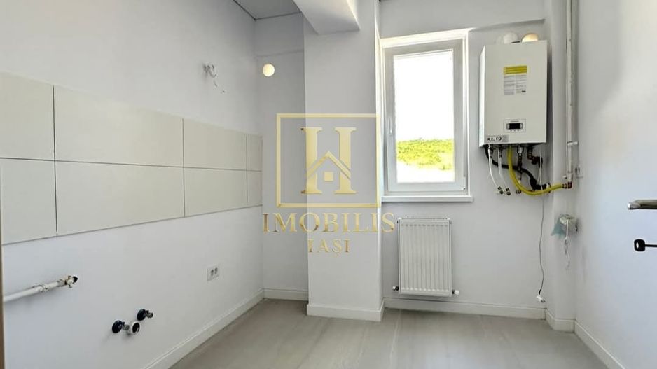 Apartament 1 camera decomandat 40 mp Bucium 66300 euro - Poză 2