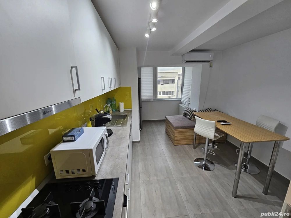 Închiriez garsonieră modernă, în zona Nerva Traian - Unirii - Poză 3