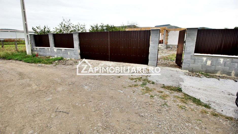 Casa 5 camere pe 1 nivel cu garaj si gard 176mp,1400mp teren - Poză 6