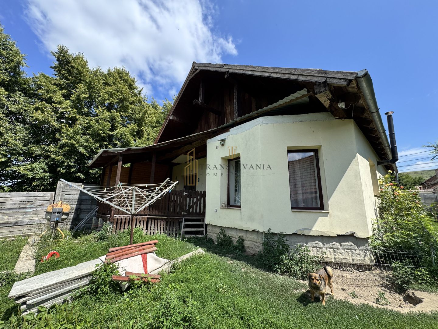Casă la țară cu teren generos în satul Ruși - Poză 6