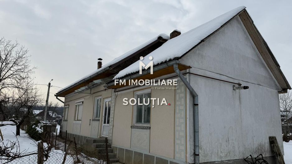 Casă cu teren generos în Buciumi - Poză 5