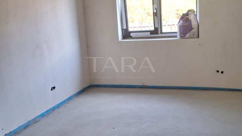 Casa modernă în Feleacu, cu teren de 850 mp, terasă generoasă și curte amenajată - Poză 6