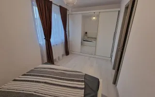 Apartament 2 camere de închiriat în Alexandru cel Bun, renovat integral și mobilat modern - Poză 11