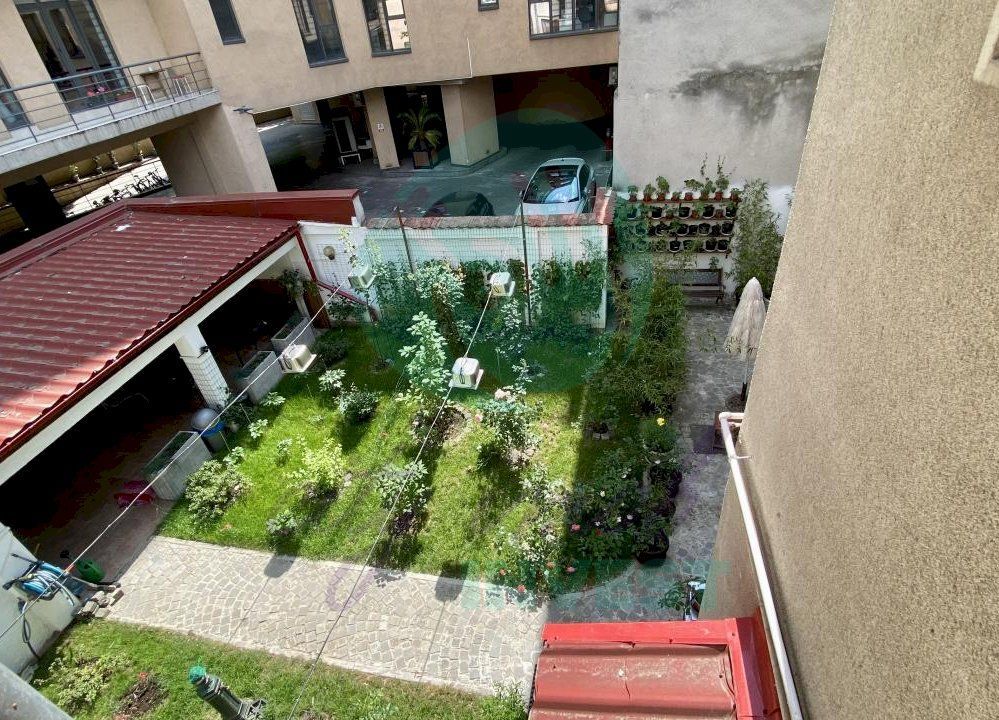 Casa cocheta cu gradina - Poză 1
