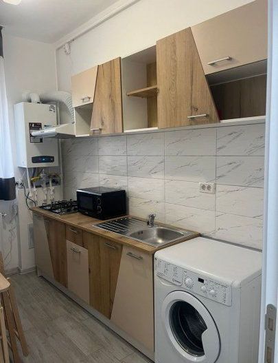 Garsoniera demisol foarte inalt centrala 26 mp - Poză 5