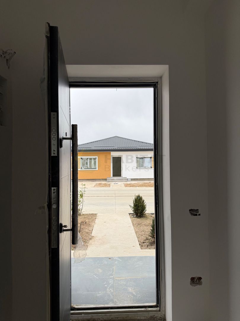 Casa 4 camere pe parter-Tunari | Teren 400 mp - Poză 19