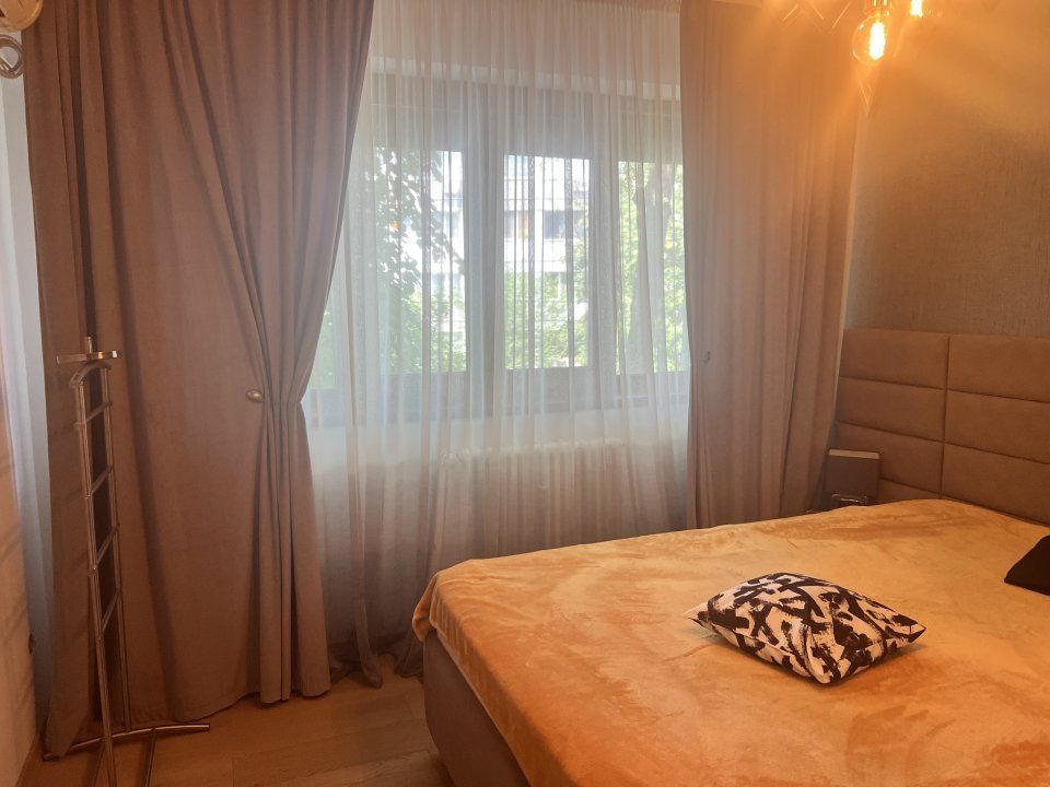 Spre închiriere apartament 3 camere renovat - Poză 14