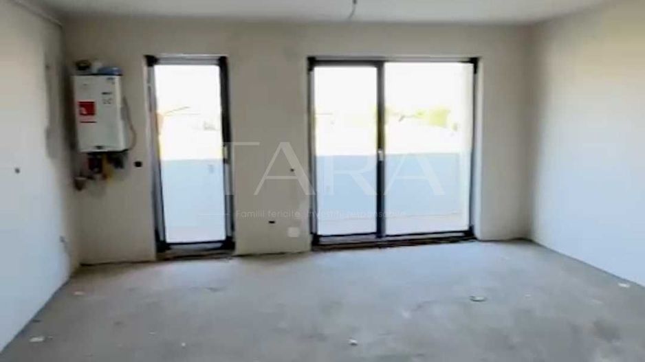 Apartament cu 2 camere, 55 mp, balcon generos și garaj subteran. - Poză 1