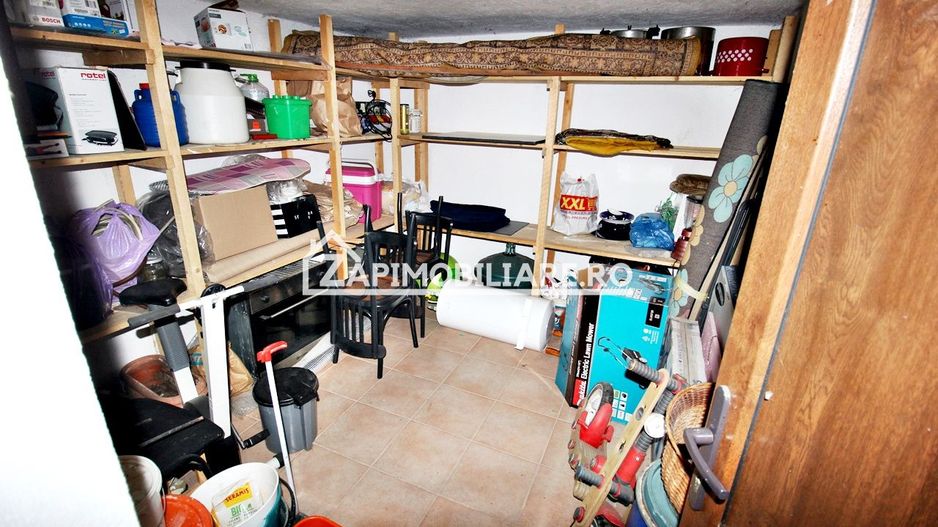 Casa 3 camere, 2 bai,1 garaj,teren 360 mp.zona Dambu Pietros - Poză 16