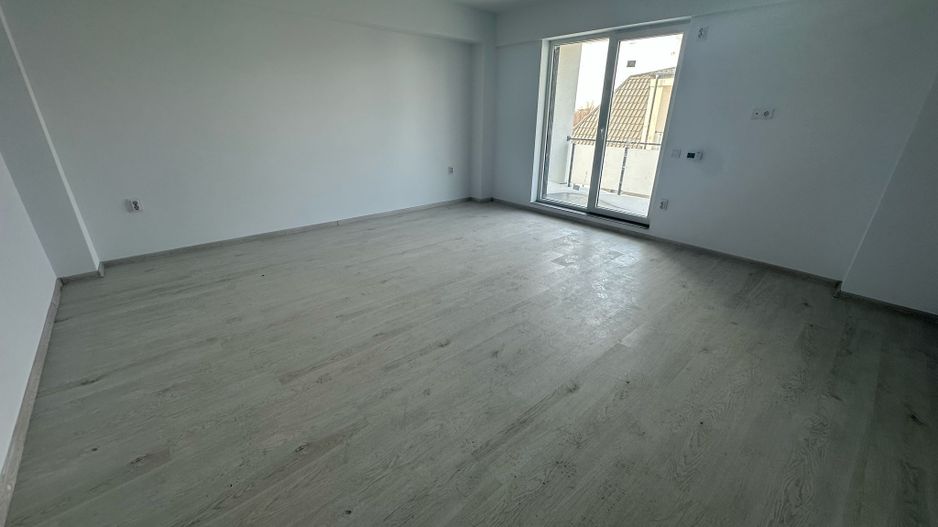 Apartament nou de vânzare Otopeni – 2 camere, balcon, parcare inclusă - Poză 1