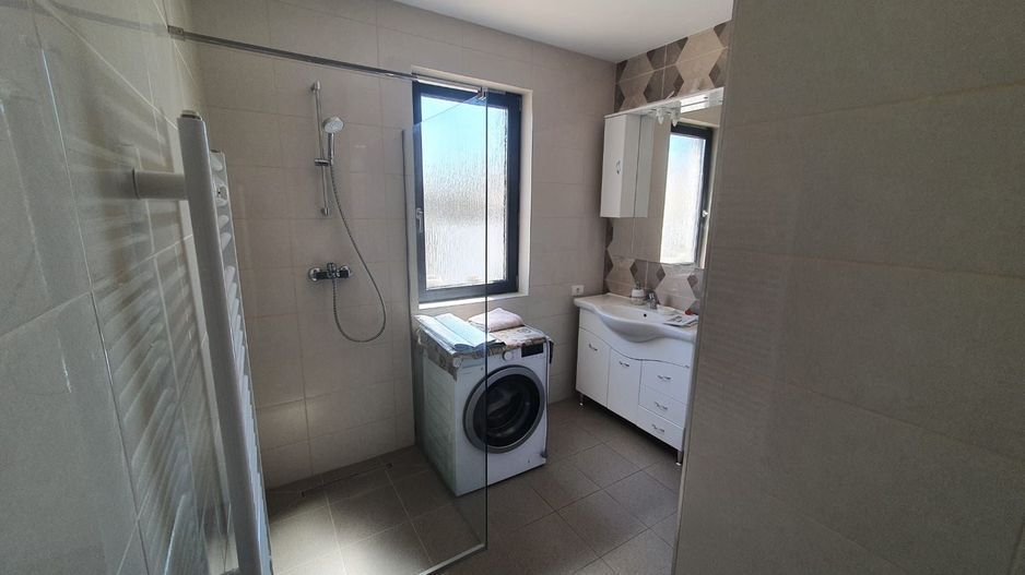 Casa cu 4 camere si garaj - Poză 4