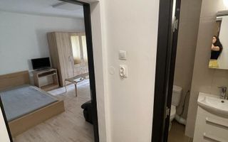 Închiriez garsonieră, Piața Victoriei, modernă, cu boiler - Poză 4