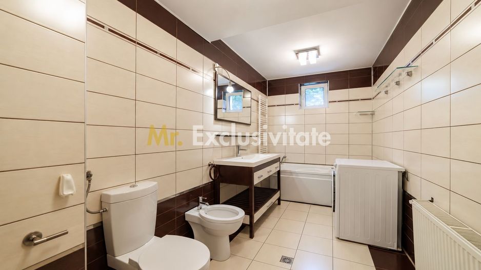 Eleganță și confort pe 500 mp de teren - Vilă în Ștefănești - Poză 28