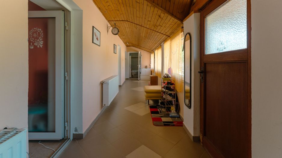 Casă cu teren 3332mp în Bătania - Poză 11