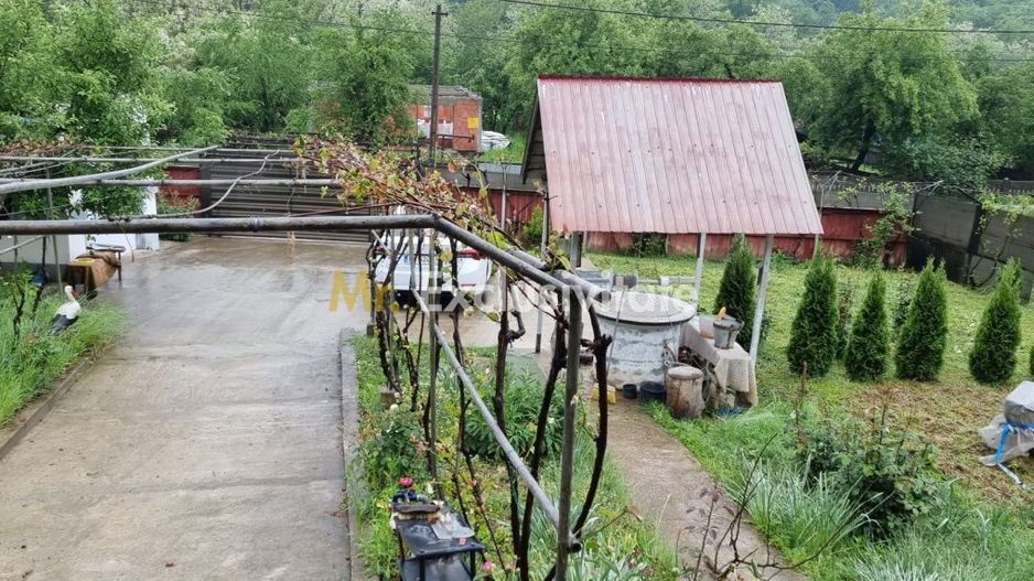 Casă P+M cu 1.558 mp teren, livadă și garaj - Poză 7
