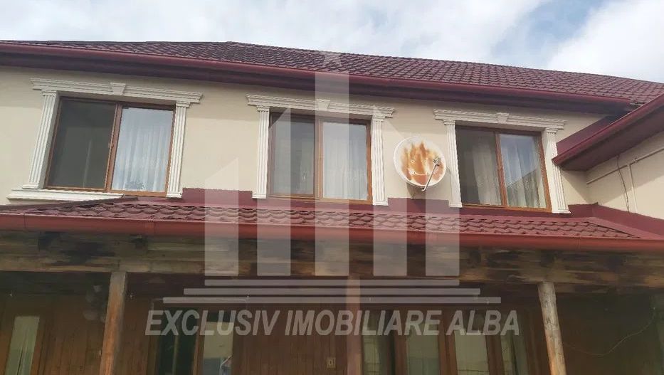 Casa de vanzare in Lipoveni - Poză 2