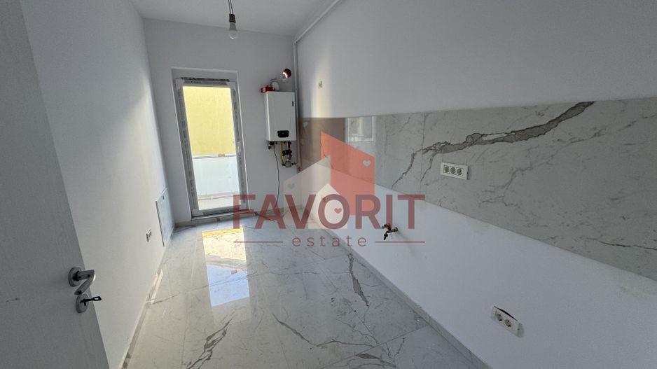 Bloc nou. TVA 21% inclus in pret. Strada asfaltata - Poză 7
