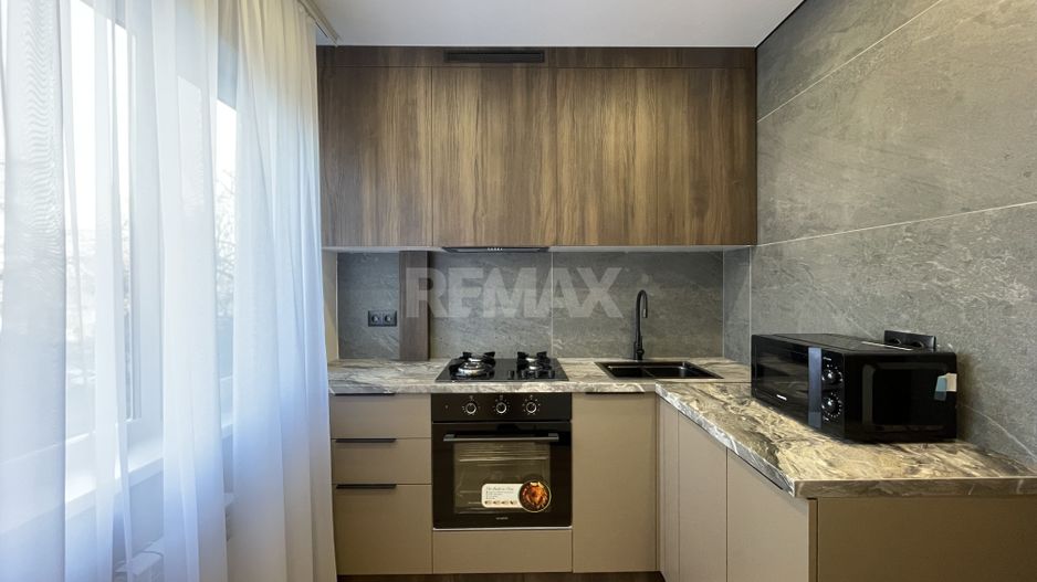Apartament cu 2 camere plus living, sector Botanica - Poză 3