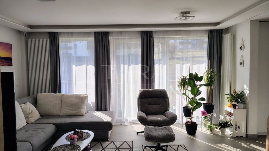 Apartament spațios și modern,  zonă liniștită și verde. - Poză 1