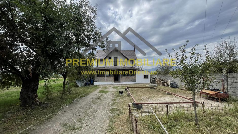 Casa de Vanzare la 10 km de Onesti - Poză 1
