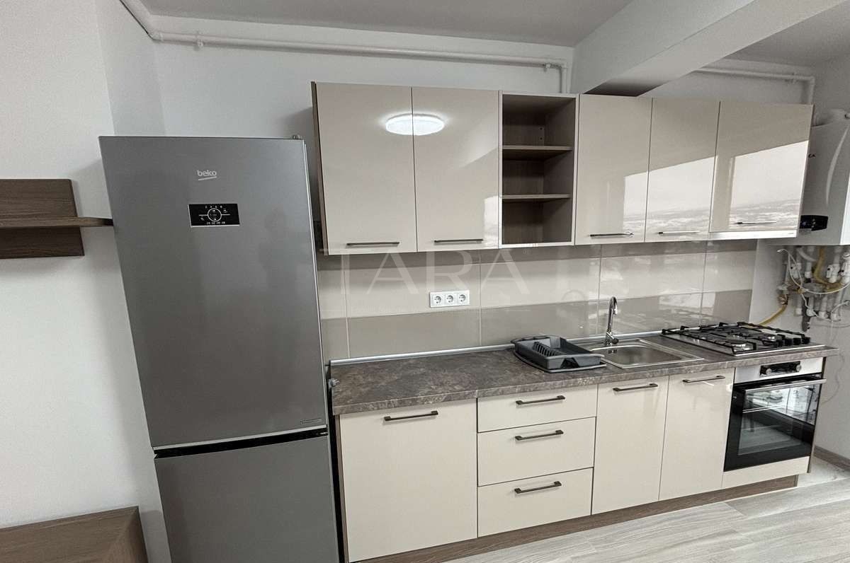 Apartament modern cu 2 camere, terasă generoasă și parcare subterană. - Poză 2