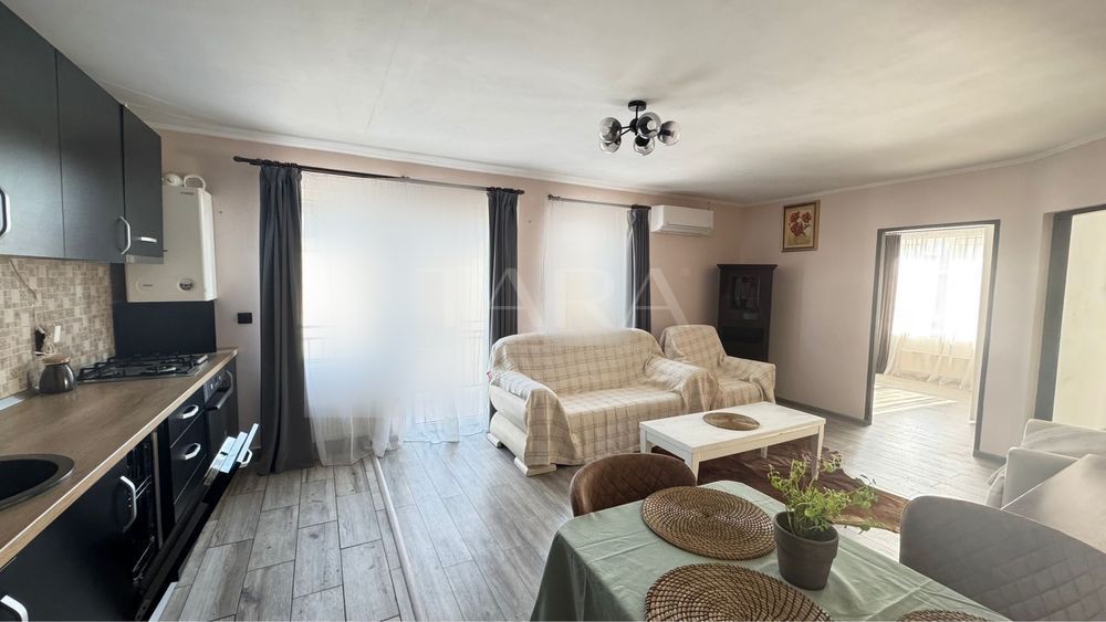 Apartament cu 3 camere și 2 locuri de parcare, zona Terra. - Poză 1